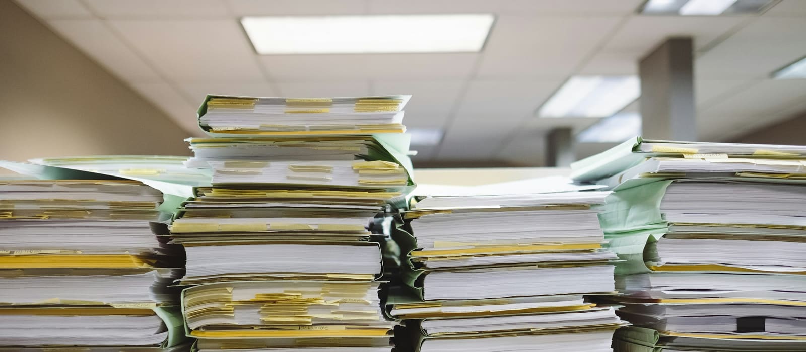 Stacks of customs and shipping documents prepared for filing