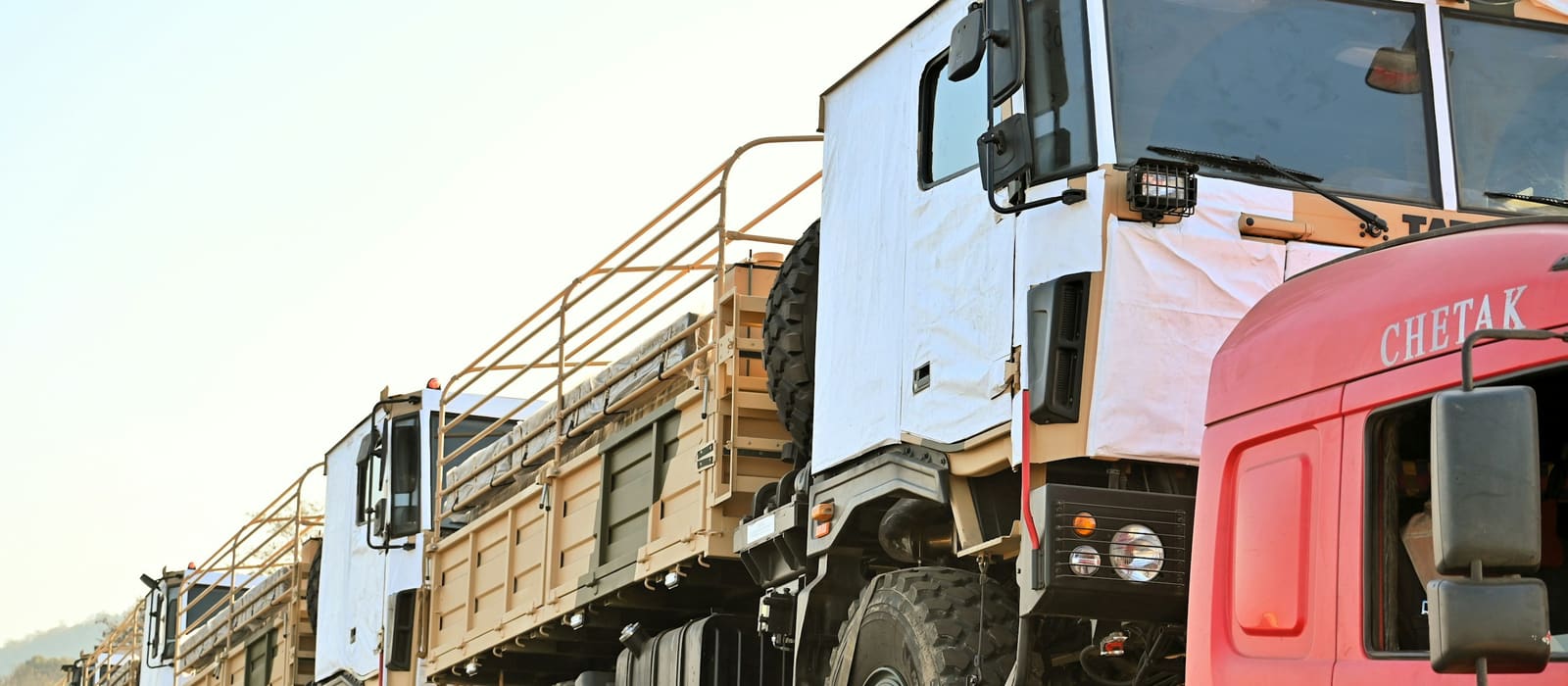 Container truck moving cleared cargo along a highway